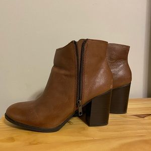 ALDO faux leather brown heeled ankle boots with outside zipper.